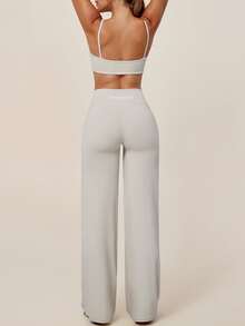 TimeOff Women's One Set Solid Color Spaghetti Strap Backless Bra High Waist Tummy Control Wide Leg Pants Sports Set - Apricot - View 10