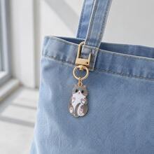 Miniso 1pc Cute Cat Keychain, Mini Kitten Pendant With Gold-Tone Lobster Clasp, Lightweight Bag Charm For Handbag, Backpack, Purse, Pouch And Keys, Cat Lover Gift, 4 Styles Available - Gray & White Cat - View 1
