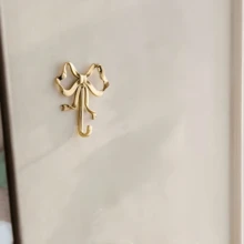 1/2pcs Gold Elegant Bow Metal Wall Hooks, Exquisite Painted Craftsmanship, Sturdy And Durable, No-Drill Convenient Wall Storage, Can Hang Keys, Hats, Clothes, Suitable For Entryway, Living Room, Bedroom, Bathroom, Princess Room Decoration, Simple And Highly Attractive, Home Wall Organization Essential - Multicolor - View 10