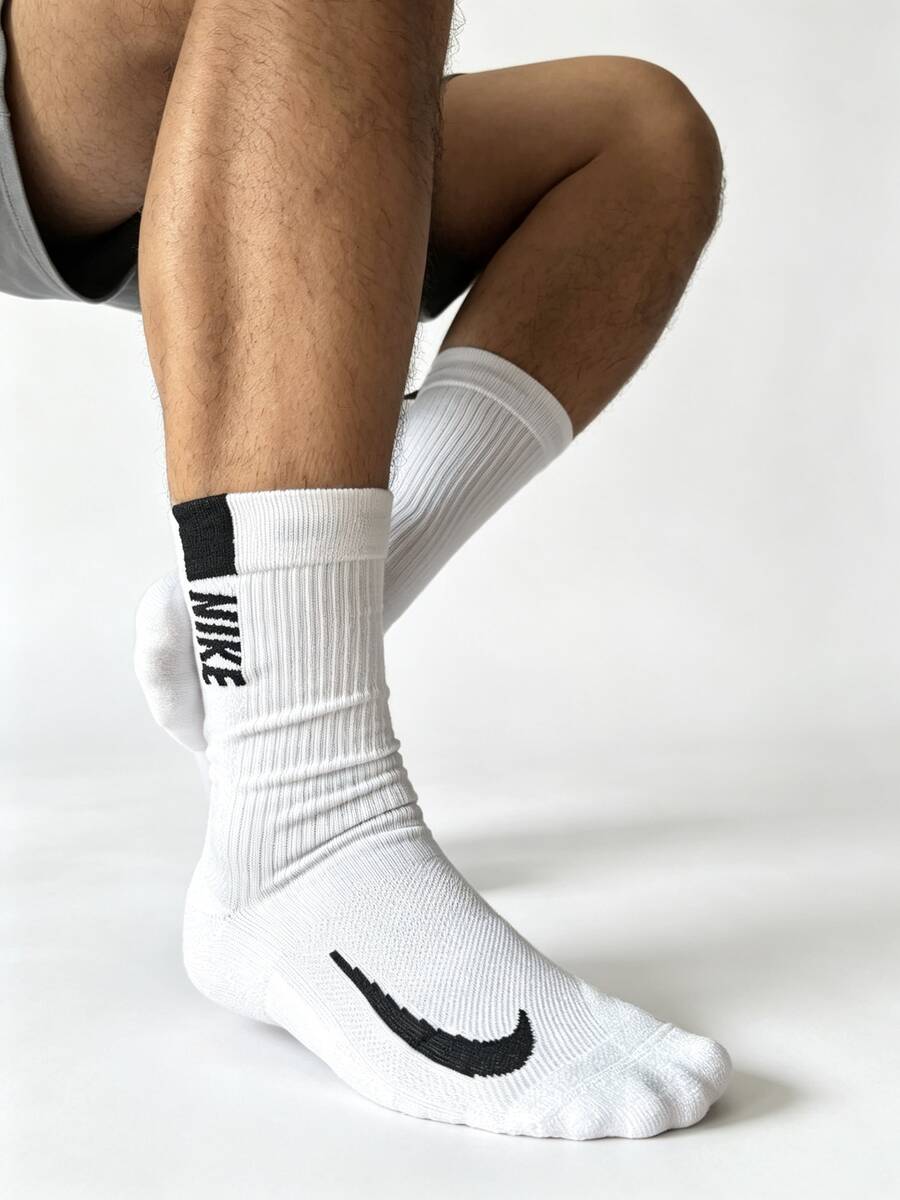 Kaos kaki panjang rajut kasual untuk latihan lari, olahraga, dan aktivitas luar ruangan dengan logo Nike tercetak, unisex, warna putih, isi 2 buah. - Putih - View 1