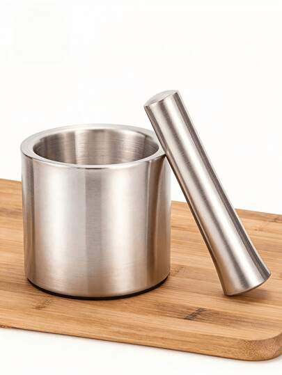 Haus Hana Machacador de Ajo Profesional de Acero Inoxidable 304 (1 pieza), ideal para preparar pasta de ajo fresca, purés de hierbas aromáticas y especias molidas finamente.Diseñado con ergonomía avanzada: mango antideslizante, base estable y cabeza maciza que maximiza la presión sin esfuerzo.Resistente, higiéni