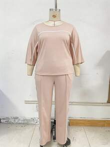春夏大尺碼女款圓領 3/4 袖 T 恤與休閒日常彈性腰鬆身長褲 2 件套，大尺碼友善，顯瘦修身，視覺遮瑕，適合日常休閒、運動、健身、跑步、機場穿搭，舒適居家與旅行套裝 - 粉色 - 查看 2