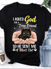 Camiseta Divertida para Entusiastas de los Gatos. Pedí un Verdadero Amigo a Dios y Me Regaló un Gato Negro. Presenta una Frase Cautivadora y un Diseño de Gatito. Hecha de Tela Casual con Cue - Negro - Ver 1