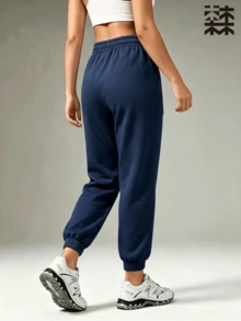 mulinsen Women's Cuffed Sports Long Pants, Double Drawstring Side Webbing Decor Loose Slimming Solid Color Casual Cuffed Pants, Suitable For Sports, Fitness, Commuting, Daily Wear - Navy Blue - View 2