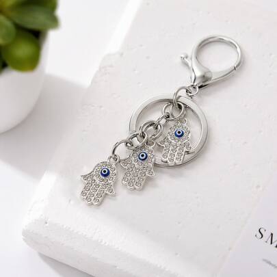 1 pièce Porte-clés Main de Hamsa en strass argenté neutre avec œil maléfique, pendentif de sac à main en alliage porte-bonheur, charm de portefeuille, anneau de clé, style quotidien