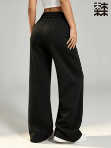 mulinsen Women's Straight Leg Wide Leg Sweatpants, Colorblock White Drawstring Side Pockets Small Logo Center Seam Slit Draped Floor-Length Straight Pants - Black - View 2