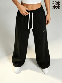 mulinsen Women's Straight Leg Wide Leg Sweatpants, Colorblock White Drawstring Side Pockets Small Logo Center Seam Slit Draped Floor-Length Straight Pants - Black - View 4