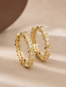 CHICAT Gold-Tone Synthetic Zirconia Knot Twisted Hoop Earrings For Women, Crystal X-Wrap Hinged Round Earrings, Vintage Glam Punk Statement Jewelry - Gold - View 1