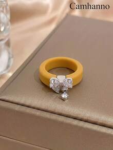 1 buah Cincin Silikon Lembut Warna Kuning Mustard dengan Aksesori Zirkonia Gantung Simpul Pita, Ramah Kulit dan Tahan Aus, Cincin Serbaguna untuk Suasana Sehari-hari - Perak - View 5