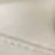 أبيض