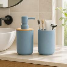 This 2 Pieces Bathroom Accessory Set Creates A More And Coordinated Visual Effect For Your Sink Area. The Set Includes A Refillable Pump Soap Dispenser And A Matching Open-Top Rinse Cup, Both In A Soft Grey-Blue Tone. The Soap Dispenser Features A Natural Bamboo Lid For A Warm Visual Contrast, And The Smooth ABS Material Body Gives The Overall Design A Minimalist, Fresh, And Modern Look. The Soap Dispenser Can Hold Hand Soap Or Hand Lotion. - Blue - View 3