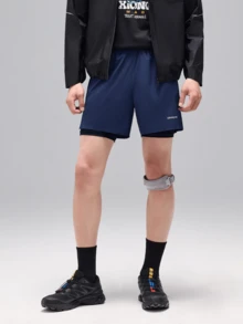 CAMEL CROWN Men's New Summer Quick Dry Sports Shorts, Loose Layered Design Athletic Pants For Workout & Running - Dark Blue - View 1