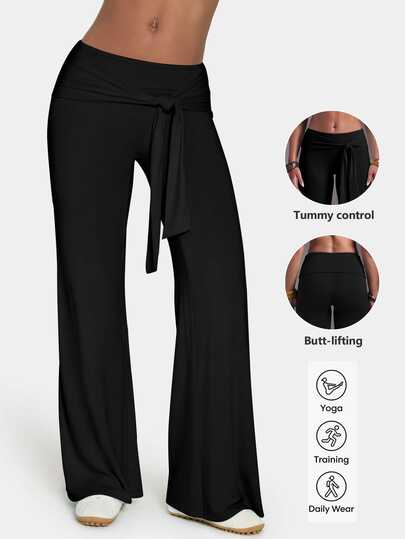 Pantalon noir décontracté à taille haute et jambes larges, avec nœud à la taille avant, design de pli à la taille arrière, minimaliste et épuré, tissu drapé, amincissant et élançant