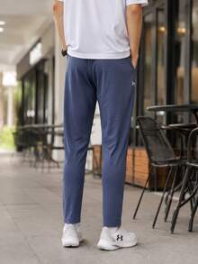 Under Armour 男士針織長褲 Twister Pant 保暖內裡 舒適柔軟 跑步訓練健身運動休閒 1379876-044 - 藍色 - 查看 3