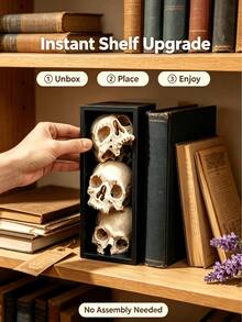 ديكور رف كتب بتصميم جماجم متراصة | ديكور رف كتب قوطي بتصميم جماجم متراصة، مناسب لرفوف الكتب والمكتبات والمكاتب وعروض هالوين ومساحات الأكاديمية المظلمة - جمجمة - مشاهدة 1