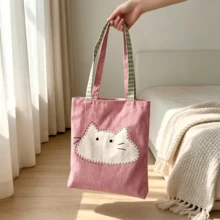 1pc Soft Cute Cat Applique Tote Bag, Fresh Pink Tone With Plaid Strap, Hand-Stitched Cute Cartoon Pattern. Large Capacity Interior Can Store Books And Personal Items, Durable And Wear-Resistant Fabric. Simple Open Design For Easy Access, Suitable For Commuting, School, Shopping And Travel. Lightweight And Portable, Healing And Charming Design, Both A Practical Daily Item And A Thoughtful Gift For Friends, Balancing Aesthetics And Functionality - Multicolor - View 2