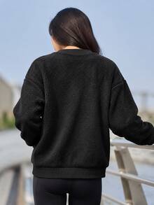 Under Armour Women's Mission Boucle Crew Neck Long Sleeve Sweatshirt Loose Woven Pullover 1367056-001 - Black - View 4