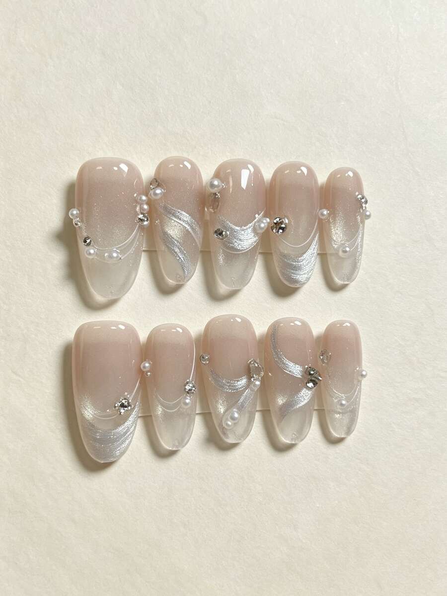 10pcs Handmade Press-On Nails, Nude Almond Shaped Fake Nails, Cat Eye Silver Ribbon Pearl Rhinestone Decorated Nail Tips, Glossy Reusable Artificial Nails, Suitable For Women Elegant Romantic Style Wedding Date Daily Nail Decor - Multicolor - View 1