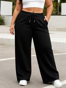 Plus Size Women's Solid Color Wide Leg Sweatpants, Drawstring Elastic Waist, Side Pockets, Casual Loose Athletic Lounge Pants - Black - View 1