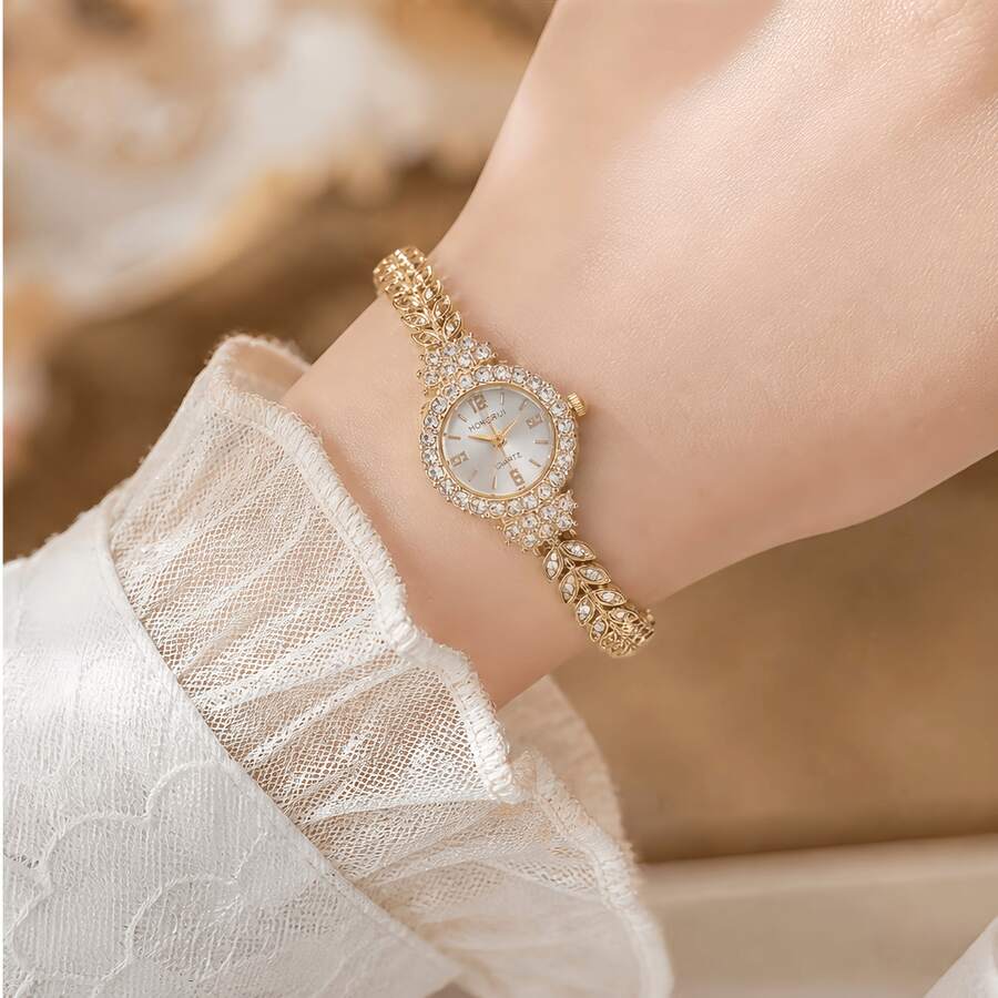 ساعة يد كوارتز فاخرة للنساء مرصعة بالراينستون بقرص دائري، سوار معدني ذهبي على شكل قمح، ساعة أنيقة للسيدات للحفلات والاستخدام اليومي - الذهبي - مشاهدة 1