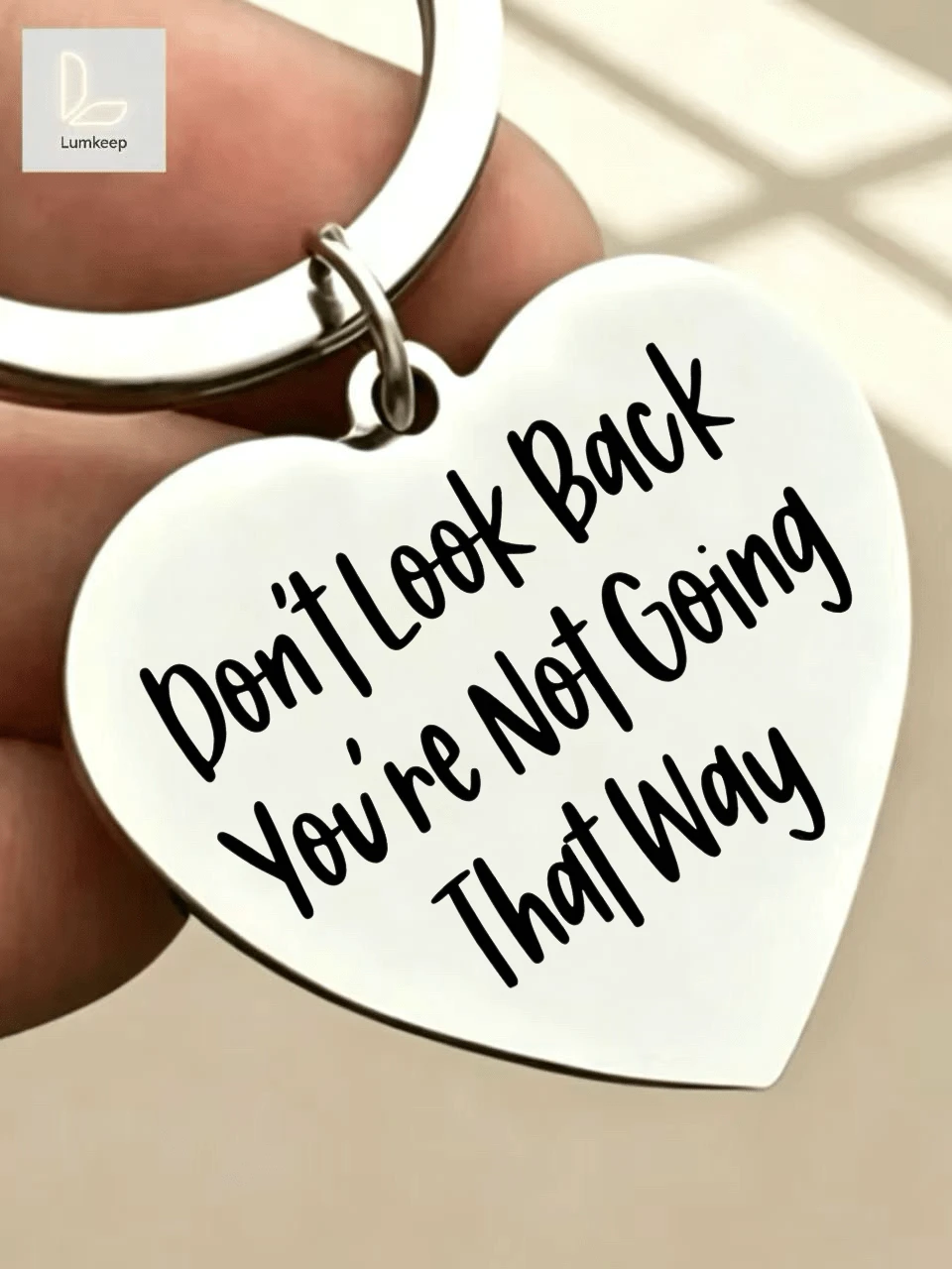 1pc Heart Keychain –"Don't Look Back You're Not Going That Way" Inspirational Quote Charm | Silver-Tone White Background Bold Text | Perfect Gift For Graduation, New Job, Breakup Or Fresh Start | Daily Motivation & Empowerment For Her/Him - Thickened Upgraded Version - View 1