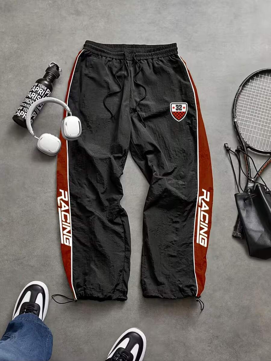 1pc Racing Style Sports Long Pants, Elastic Drawstring Waist, Side Contrast Color Webbing With Letter Print, Badge Patch Decoration, Adjustable Hem, Lightweight Fabric, Streetwear Vibe - Black - View 1