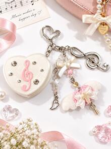 Móc khóa treo túi hình trái tim nốt nhạc ngọt ngào, thiết kế nơ đính đá rhinestone và cánh thiên thần, bộ sắp xếp cáp dữ liệu và dây tai nghe di động, móc khóa trang trí túi đa năng, phù hợp cho túi xách, ba lô, túi đeo chéo, đi làm hàng ngày, du lịch, quản lý cáp bàn làm việc, phụ kiện quà tặng dễ thương tinh tế, hoàn hảo cho bạn gái, bạn bè, quà sinh nhật, lễ hội, phong cách Âu Mỹ, kết cấu sáng bóng sang trọng nhẹ nhàng, tiện dụng và di động, tiết kiệm không gian, tăng phong cách và sự tinh tế cho túi, đa năng và bắt mắt - Nhiều màu - Xem 5