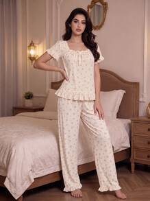 طقم بيجامة RS Pajama1 بطبعة زهور من قماش الكريب الفقاعي، مع كشكشة وأكمام قصيرة، مزين بفيونكة، بياقة مربعة وقصة فضفاضة - لون مشمشي - مشاهدة 3
