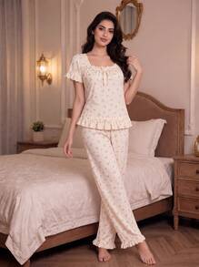 طقم بيجامة RS Pajama1 بطبعة زهور من قماش الكريب الفقاعي، مع كشكشة وأكمام قصيرة، مزين بفيونكة، بياقة مربعة وقصة فضفاضة - لون مشمشي - مشاهدة 1