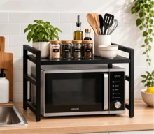 Extendable Kitchen Storage Rack, Black Single-Tier Counter Shelf With Double Bar & 6 Hooks, Expandable Microwave Stand, Sturdy Metal Worktop Organiser For Oven, Air Fryer, Utensils & Seasoning Bottles, Space Saving Kitchen Storage Solution - Black - View 2