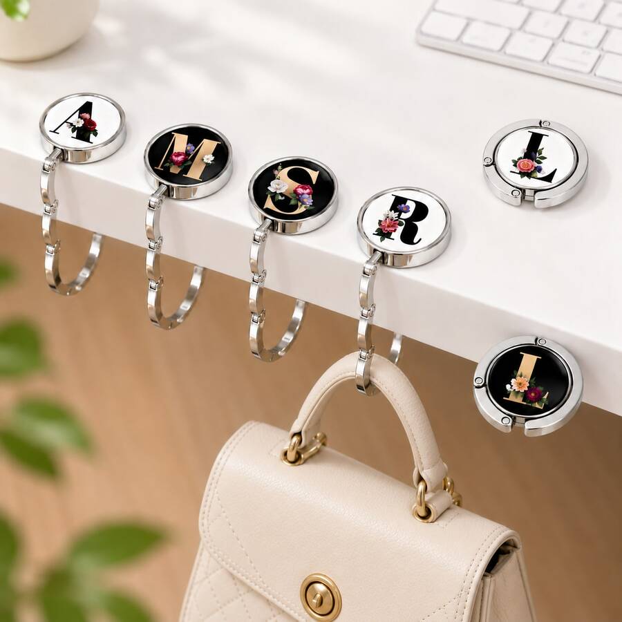 1pc Personalized Letter Initial Foldable Handbag Hook, Floral Pattern Metal Handbag Hook, Portable Non-Damaging Desktop Hook, Suitable For Women, Gravity Edge Hook
