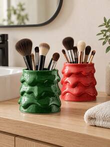 This Wavy-Textured Makeup Brush Holder-Featuring A Red And Green Color Scheme-Serves As A Decorative Vanity Organizer For Makeup Brushes And Beauty Tools. - A - View 2