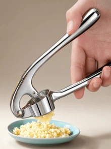 Garlic Press: A High-Quality Garlic Crusher Featuring An Ergonomically Designed Lever, Which Efficiently Crushes Garlic To Produce A Finer Paste; A Practical Kitchen Gadget. - Silver - View 1