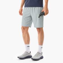 LI-NING Men's Quick Dry Sports Shorts AKSW133, Moisture Wicking Breathable Workout & Badminton Shorts - 浮石灰 - 查看 1